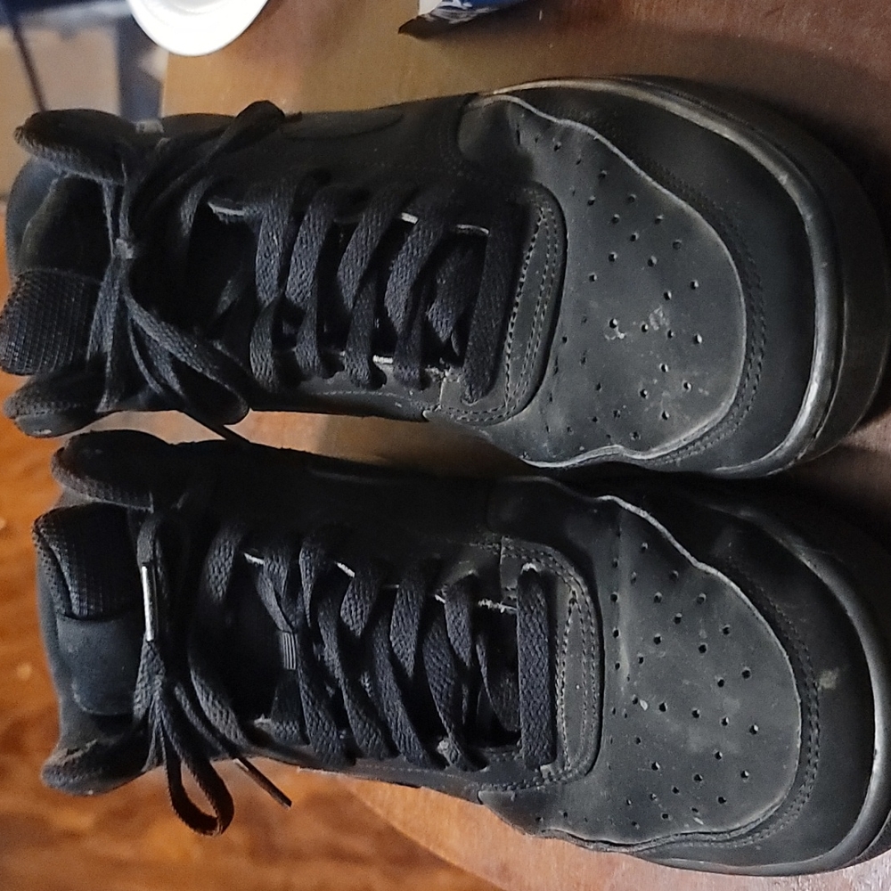 All black Nike mid Court vision sneakers